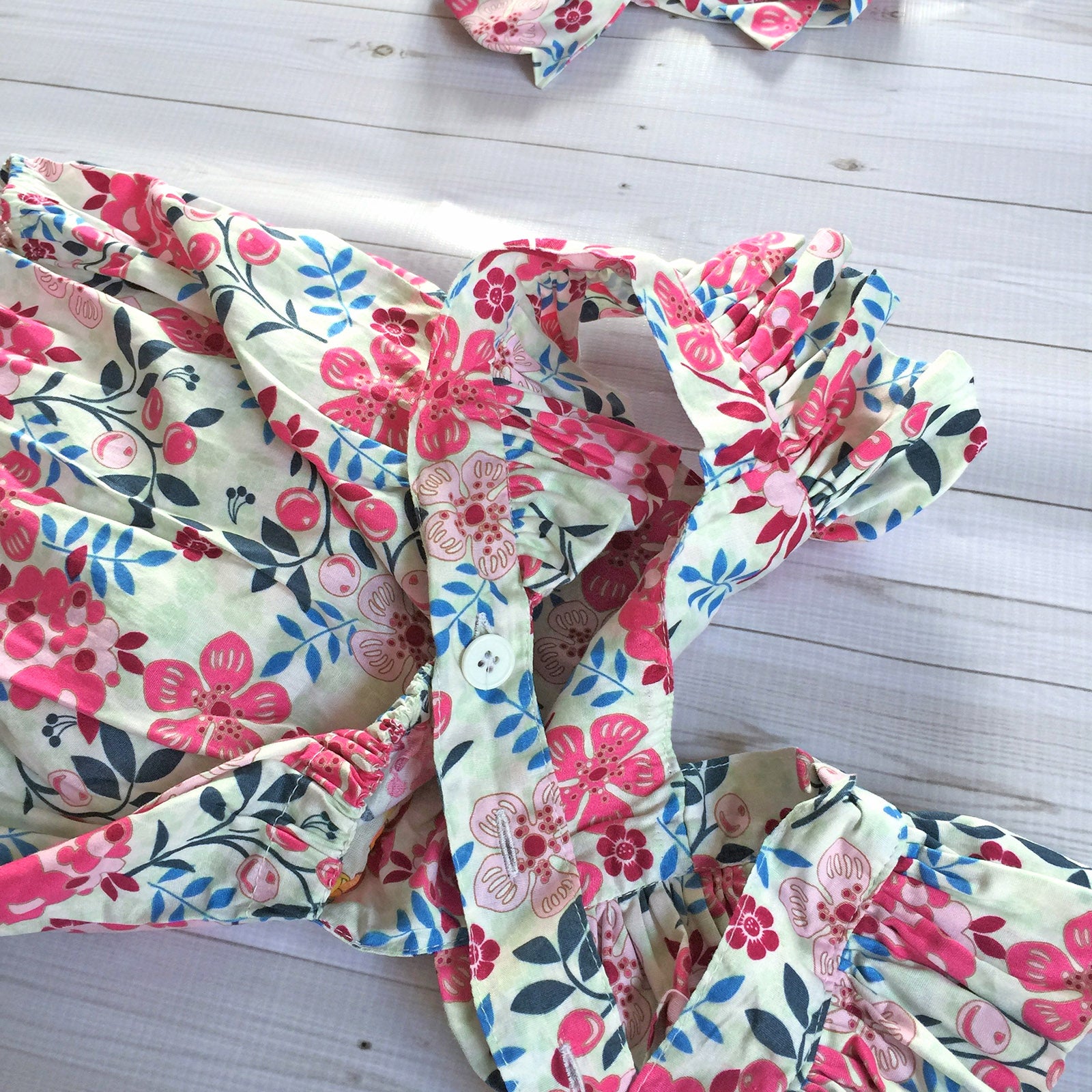 Button Floral Romper in Pink close up