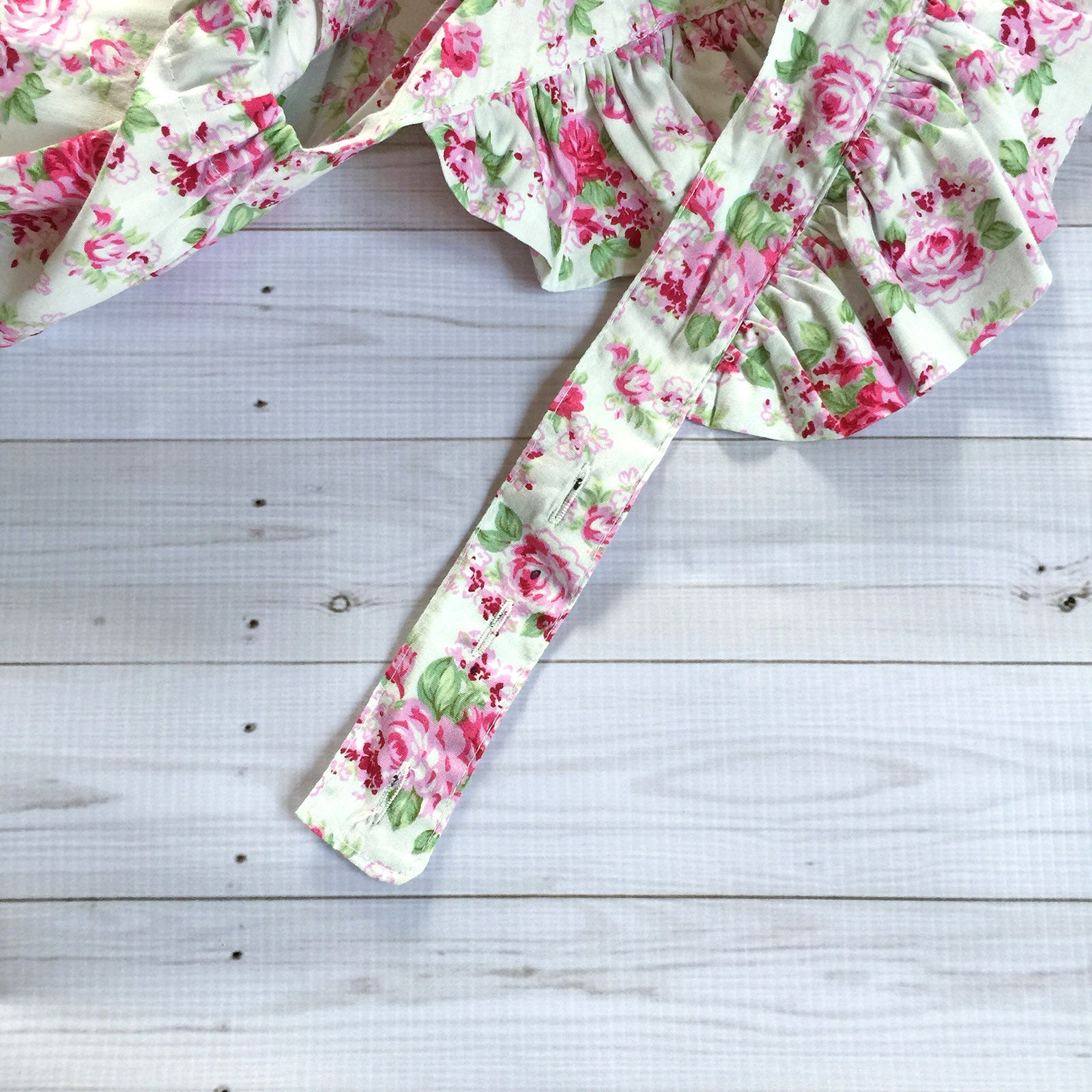 Button Floral Romper in White close up