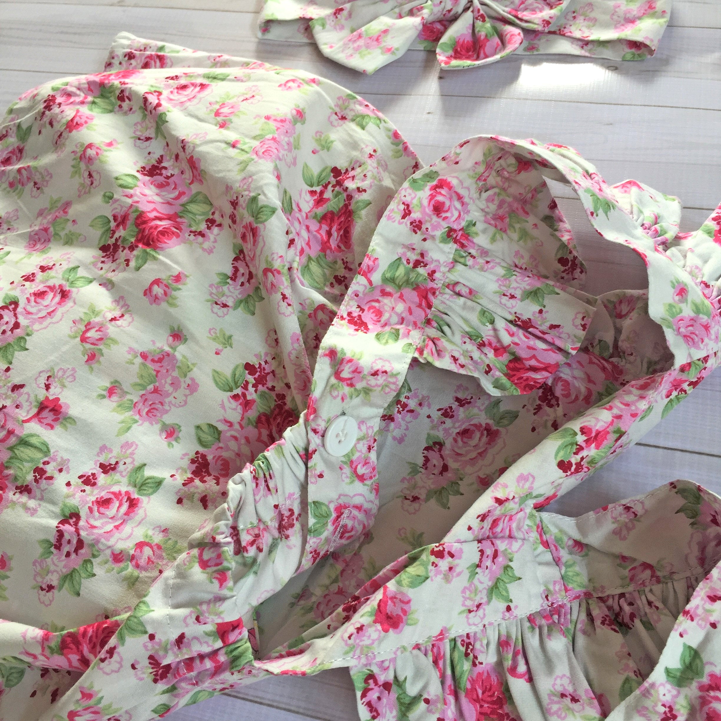 Button Floral Romper in White close up